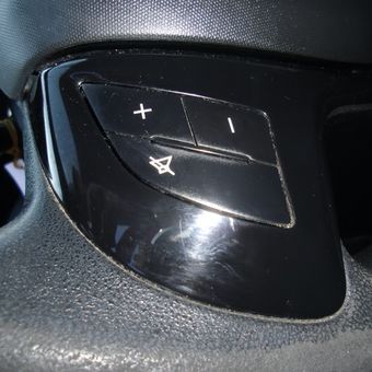 botones de volumen en volante